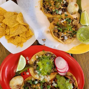 Asada, al pastor, and lengua - bottom plate  asada and carnitas - top plate