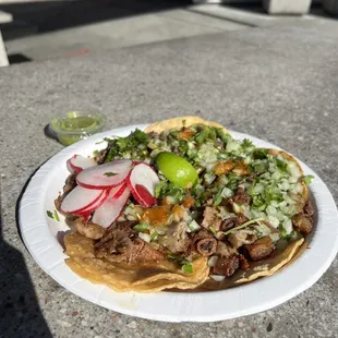 Tripas, cabasa, and carne asada tacos. (They forgot the grilled onion and jalapeño)