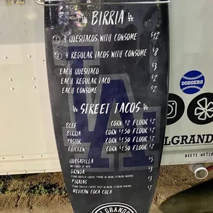 menu on a surf board. Nod to their LA roots?!