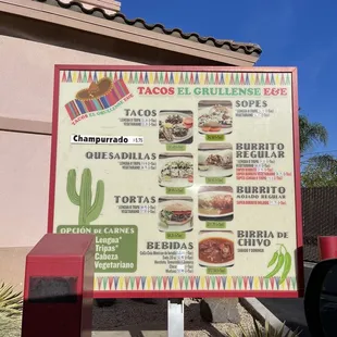 a sign in front of a restaurant