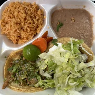 Special #3 taco and sope with rice beans and drink.