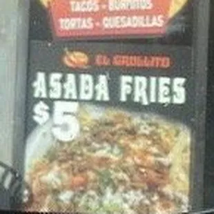 Picture on window outside of asada fries