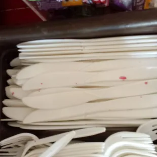 Some kind of drink stained on utensils.