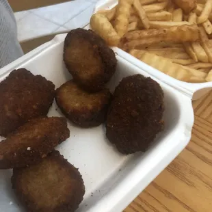 I got my son the kids meal chicken nuggets and he was not able to take a bite they are burnt and hard .