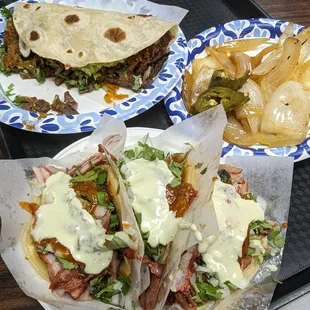 Adobada tacos and medium carne asada quesadilla