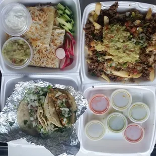 Beef quesadilla,  carne asada fries and street tacos (cow tounge, chicken and beef).
