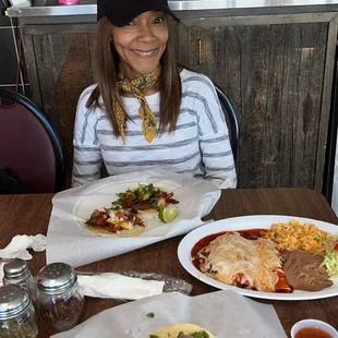 Telma enjoying her pastor tacos