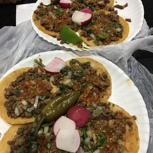 two plates of tacos