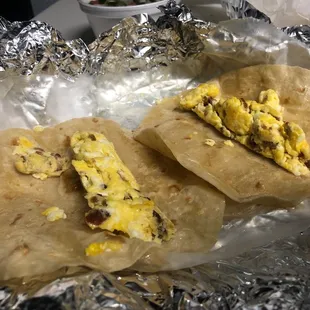 Apparently these are bacon, egg, and cheese tacos.... very little egg, very little bacon, and definitely no cheese