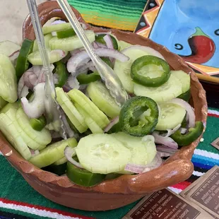 Now serving pico de gallo cucumbers  .