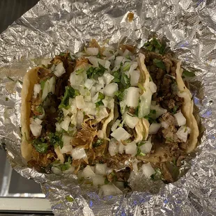 2 carnitas 2 carne asada tacos
