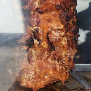 Don&apos;t know the type of meat on the skewer. Had pineapple on the top of it and looked yummy