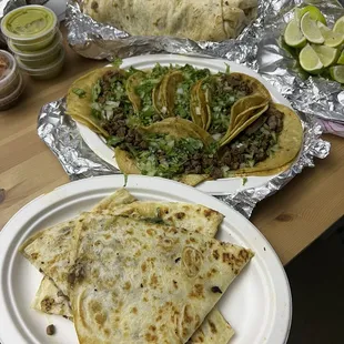 Quesadilla, tacos, and Al pastor burrito