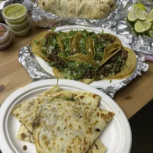 Tacos, quesadillas and Al pastor burrito.
