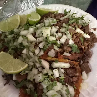 Two asada queso tacos and a cabeza vampiro