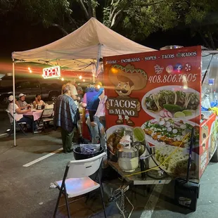 a taco stand at night