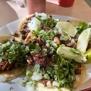 Tacos Al pastor, carne asada, chorizo, and asada.