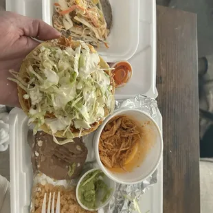 Fish taco, chicken TOSTADA- packed great to go so you can assemble when you're ready to eat it- no soggy food!!