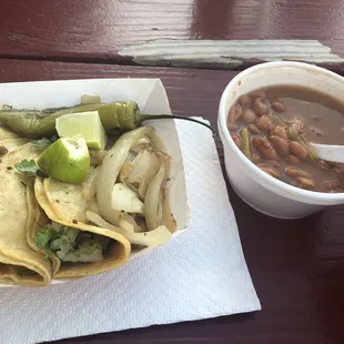 a bowl of beans and pickles