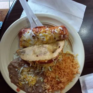 Taco and Enchilada with rice and beans.