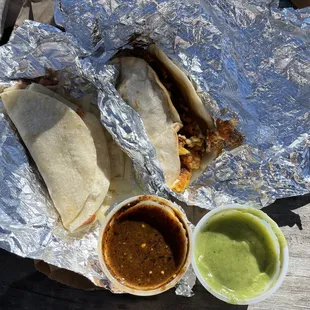 Chorizo &amp; egg taco, bean &amp; cheese. Delicious salsas!