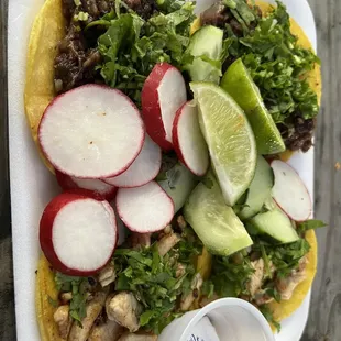 Mini tacos! Chicken one side and barbacoa on the other side. Legit!