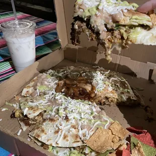 Taco pizza with beans and cheese on top.