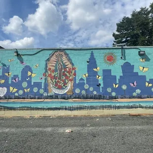 Outside Mural celebrating Immigrants and all that welcome them!