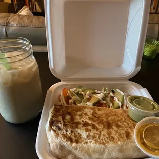 Pastor Burrito with hot sauces side salad with lettuce, radish, and avocado Horchata (~24oz)