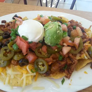 Al pastor nachos $5.50 it&apos;s better than the burrito but still pretty mediocre