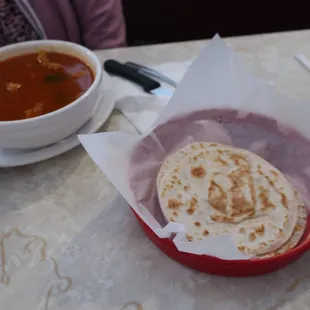 Flour tortillas with the menudo soup.