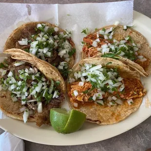 three tacoss on a plate