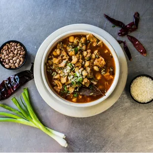 a bowl of tacos with beans and other ingredients