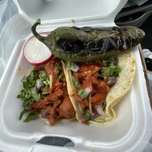 Two Pastor tacos. Delish