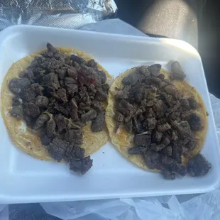 Asada tacos with cheese.
