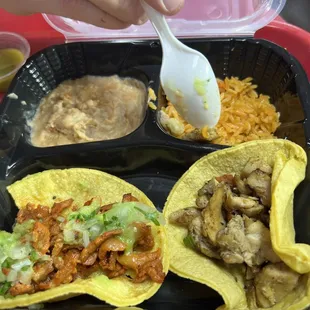 a hand holding a spoon