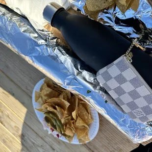 Just a comparison - water bottle is 11.9" (S'well) and a key pouch is 4.7"