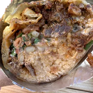 You can see the mushy rice. But this is how thick the burrito is, around 3-3.5"