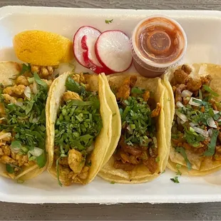 2 chicken and 2 pastor tacos. $3 each.