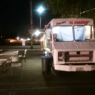 a taco truck parked in a parking lot