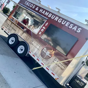 a tacos and hamburgers truck