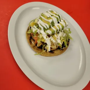 a taco on a white plate