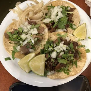 Tacos 1 cheek 1 tripa 1 head