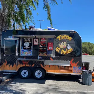 a taco truck parked in a parking lot