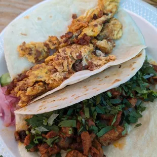 Eggs and chorizo and pastor on flour