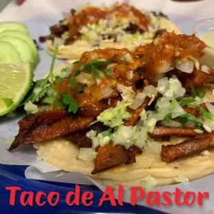 a plate of food with a lime wedge