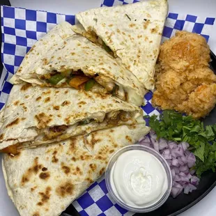 a plate of quesadillas
