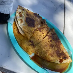 two quesadillas on a plate