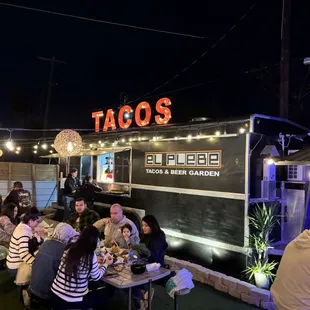 Taco truck atmosphere but is sit down dining.  A great combination.