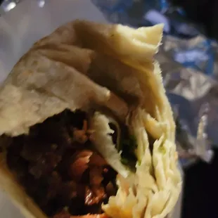 It&apos;s already a bad sign you&apos;re in a terrible Taqueria when you bite into an overly wrapped 2 meat burrito.